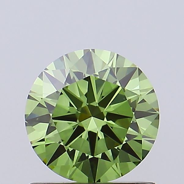 Actual 0.9 carat Vivid Green Round lab-grown diamond