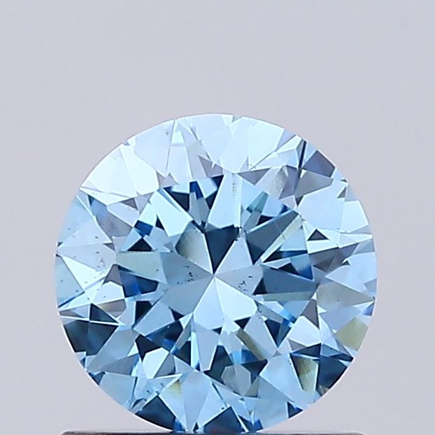 Actual 0.74 carat Vivid Blue Round lab-grown diamond