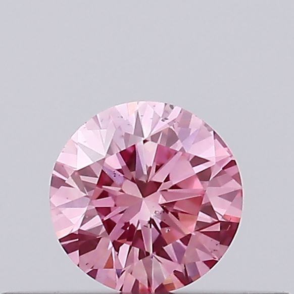 Actual 0.17 carat Vivid Pink Round lab-grown diamond