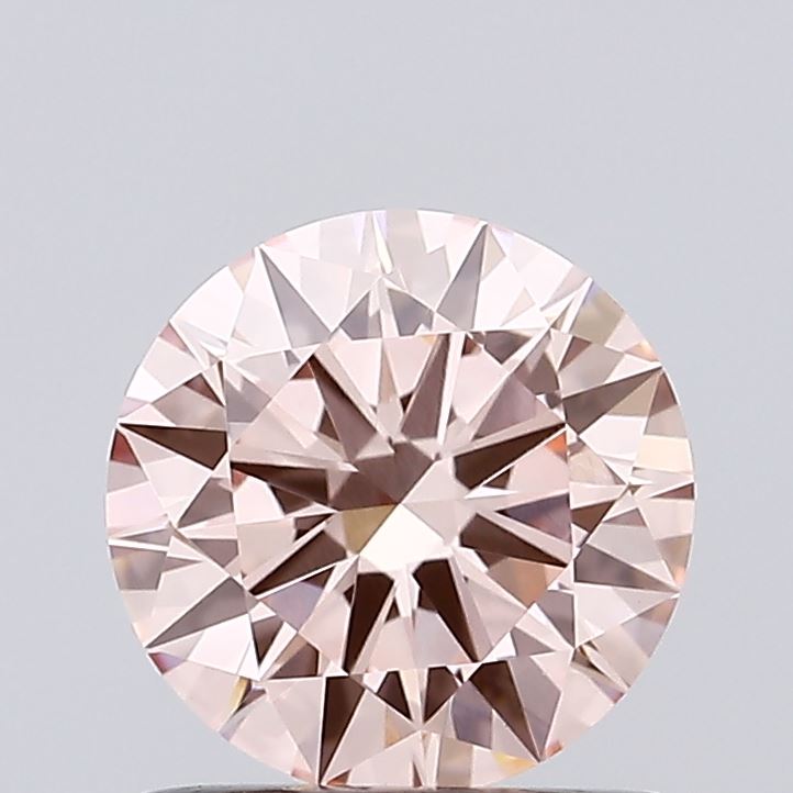 Actual 0.97 carat Vivid Pink Round lab-grown diamond